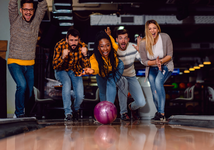 group of friends bowling during the off-season