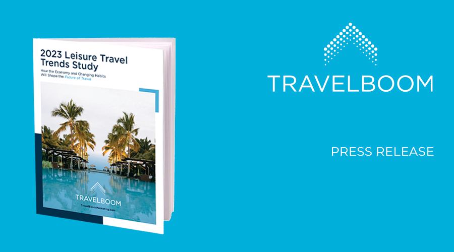 Photo of printed version of TravelBoom's 2023 Leisure Study, showing a pool that overlooks a tropical area. The words "PRESS RELEASE" are in white on a TravelBoom blue background.